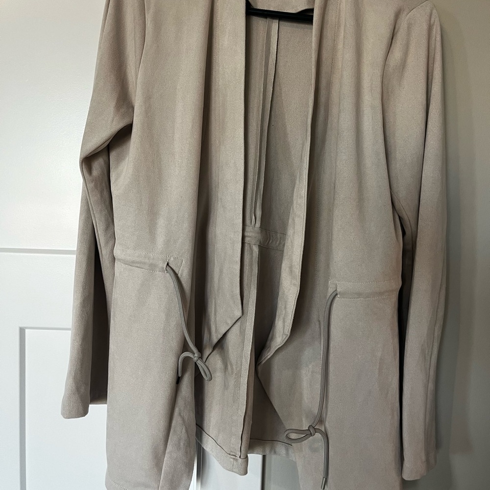 Thread and Supply medium jacket in light beige.